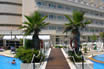 Wooden Bridge Across A Hotel Swimming Pool In Mallorca